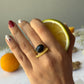 Black dot ring