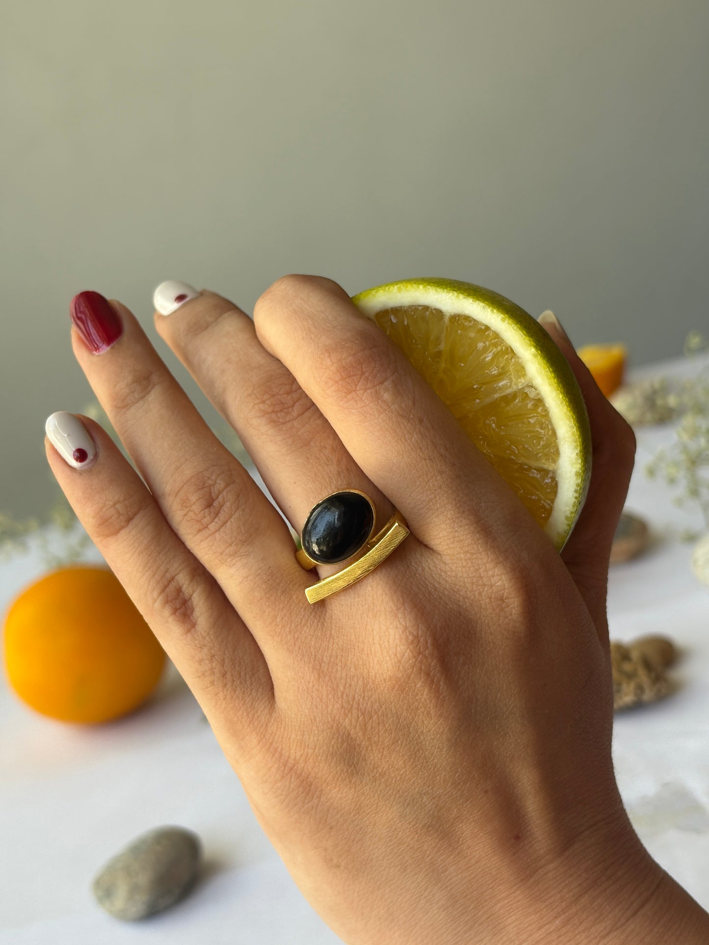 Black dot ring