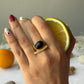 Black dot ring