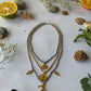 Dual tone charm necklace