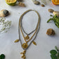 Dual tone charm necklace
