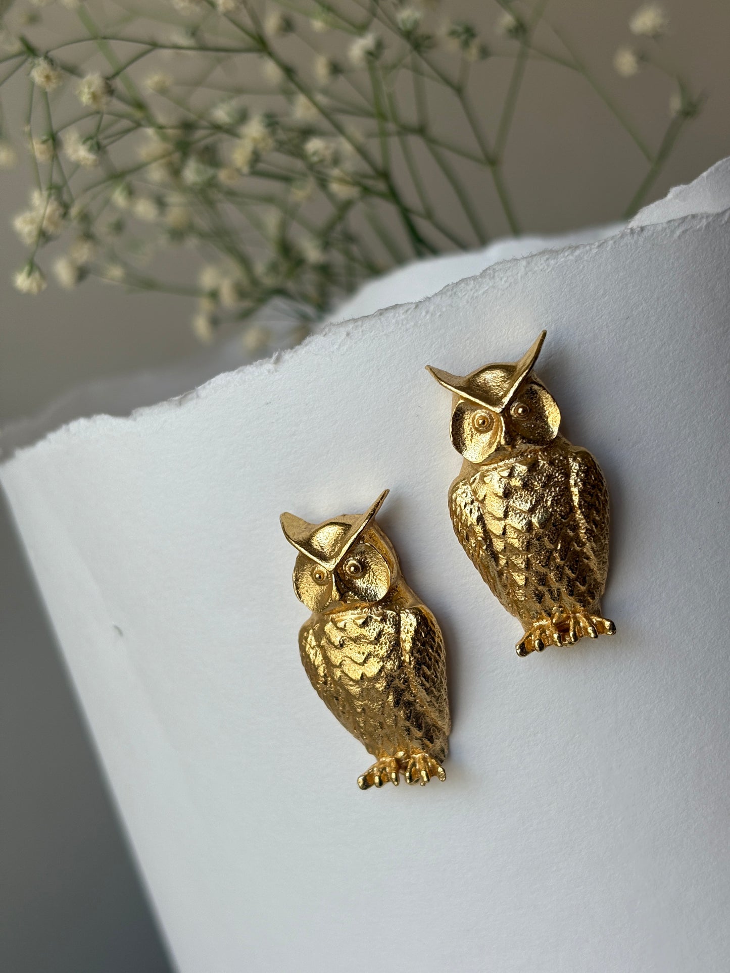 Gold owl earrings