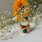Emerald circle ring