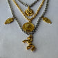 Dual tone charm necklace