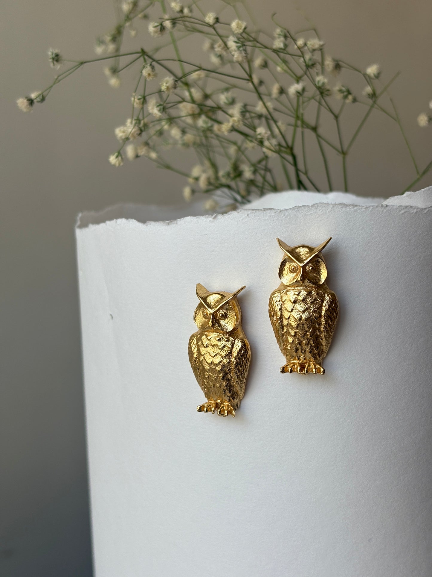 Gold owl earrings